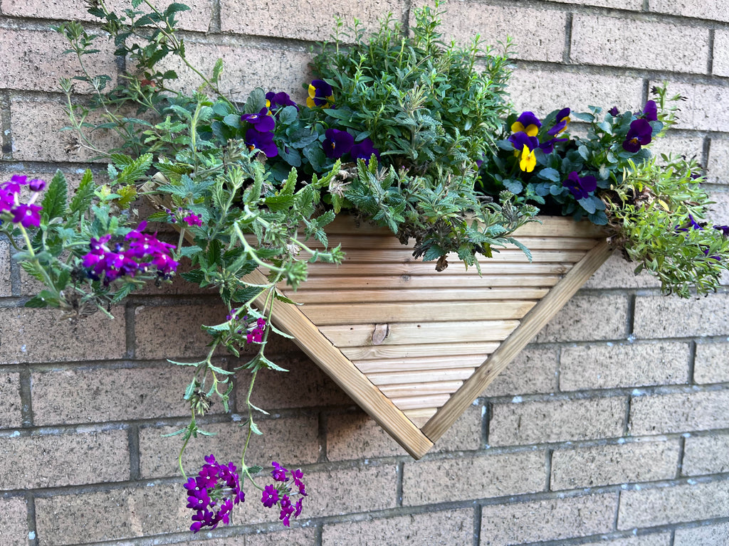 Outdoor wall-mounted planter